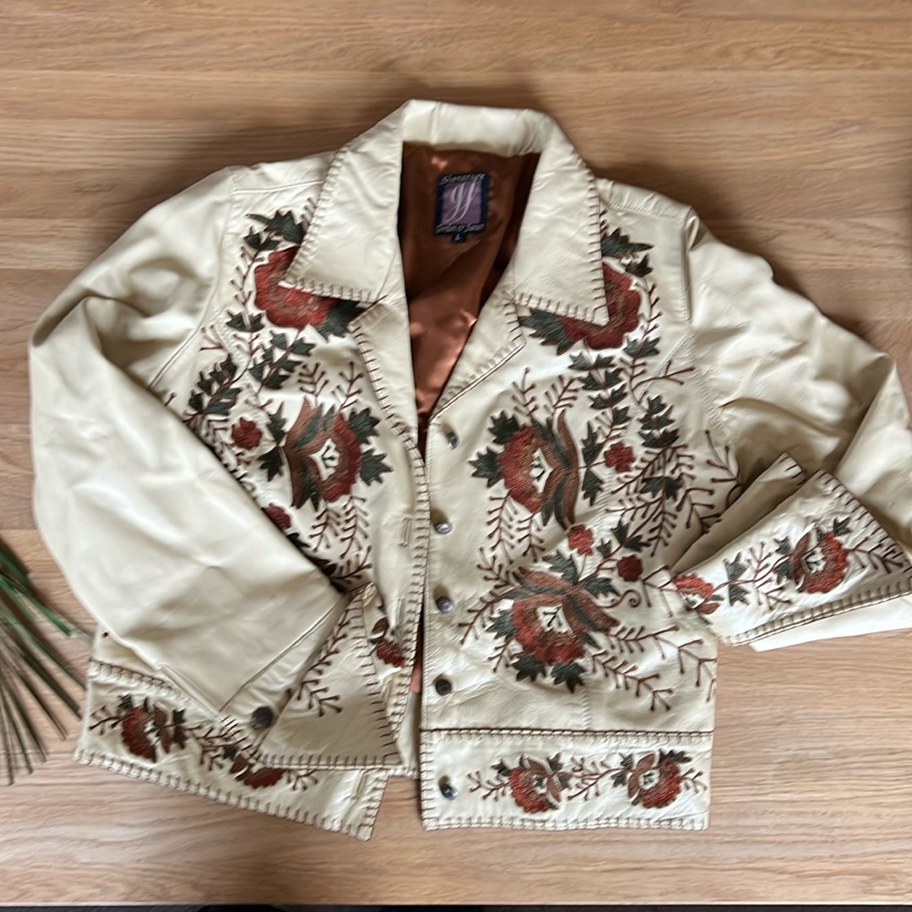 Unique vintage real leather women’s jacket with stitched embellishment